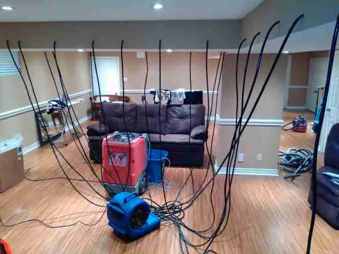 structural drying of a basement using non invasive methods
